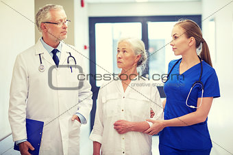 medics and senior patient woman at hospital