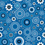 Seamless pattern with stylized flowers over blue background