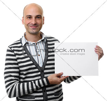 smiling guy holds a blank placard