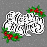 Merry Christmas lettering card with holly.