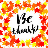Thanksgiving lettering. Greeting text and autumn leaves . Vector illustration EPS 10
