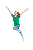 Young Girl with Blond Hair Jumping in the Air 