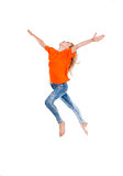 Young Girl with Blond Hair Jumping in the Air 