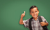 Cute Hispanic Boy In Front of Blank Chalk Board