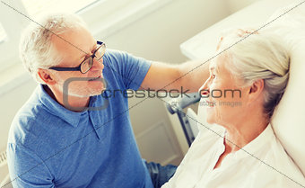 senior couple meeting at hospital ward