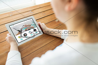 close up of woman with internet shop on tablet pc