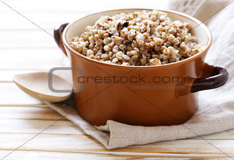 Natural organic buckwheat cereal. Boiled buckwheat porridge in a pot.
