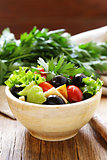 Mediterranean salad with olives, cheese and vegetables. Healthy food.
