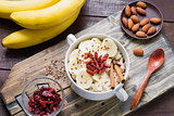 Oatmeal porridge with super foods for breakfast