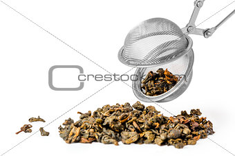 green tea and strainer on white background