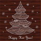 Christmas card with hand drawn decorated fir-tree on the wood