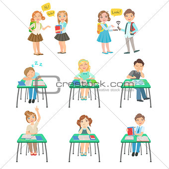 Children At School Sitting In Class And Chatting With Friends
