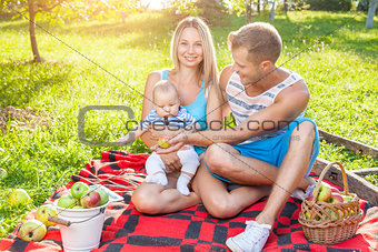 Happy family enjoying a picnic outdoors
