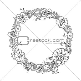 Floral hand drawn round frame in zentangle style isolated on white.