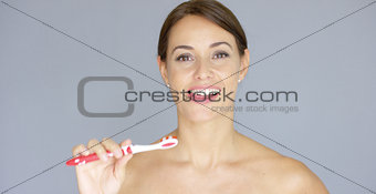 Smiling young woman with clean white teeth