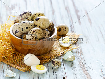 natural organic quail eggs on a wooden table