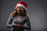 Chrismas costume on a girl holding a placeholder (front perspect
