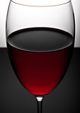 Glass of red wine close up photography