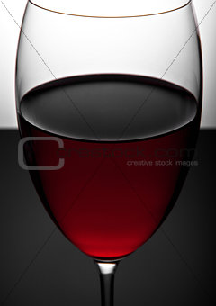 Glass of red wine close up photography