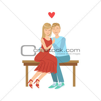 Couple In Love Hugging On The Bench