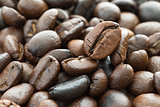 Heap of roasted brown coffee beans 