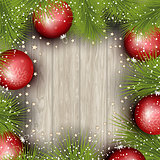 Christmas background with pine tree branches and baubles