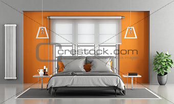 Gray and orange master bedroom