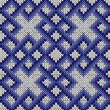 Knitting ornate seamless pattern in blue and white colors