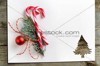 cut paper in fir-tree shape on table