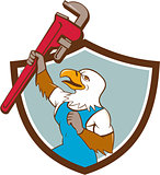 Eagle Plumber Raising Up Pipe Wrench Crest Cartoon