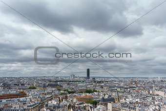 Montparnasse tower over Paris, cloudy day