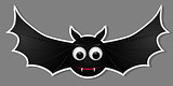 Flying bat isolated on grey background.