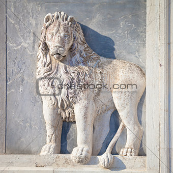 Marble lion on church facade