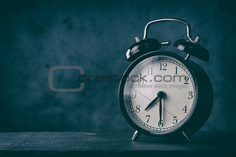 classic alarm clock on a table