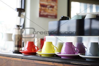 Colorful coffee cup in a coffee shop