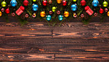 Merry Christmas Frame with real wood green pine and colorful baubles, 