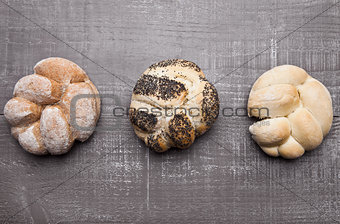 Fresh bread rolls for breakfast morning on wood