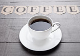 Coffee cup espresso  hot white on wooden board 