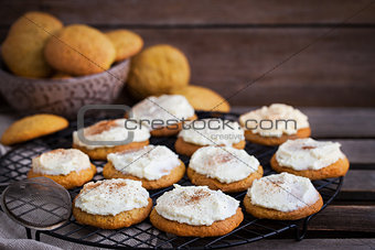Homemade pumpkin spice cake cookies with glaze and cinnamon