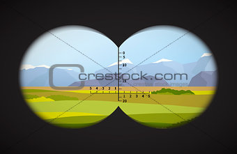 View from binoculars on landscape with fields