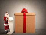 Santa Claus with gifts list