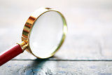 Magnifying Glass On Wood