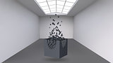 Hanging the cube from a multitude of small polygons in the large empty room. Exhibition space with abstract cubic shapes. The cube at the moment of explosion is divided into fine particles.