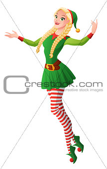 Pretty girl in green Christmas elf costume presenting and flying.