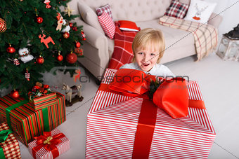 Boy with a big Christmas gift