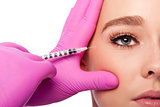 Beauty collagen filler injection in crows feet at eye