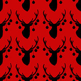 Seamless pattern with silhouette of deer head  christmas tree toys on horns  red background.