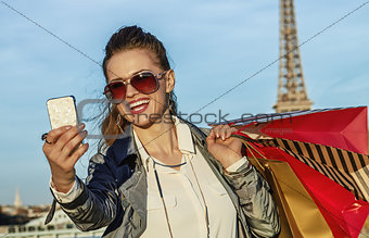 fashion-monger taking selfie with smartphone in Paris, France
