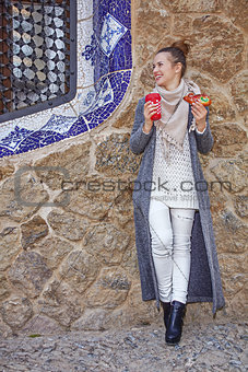 happy traveller woman at Guell Park at Christmas looking aside
