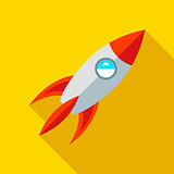 Children's toy rocket on a yellow background